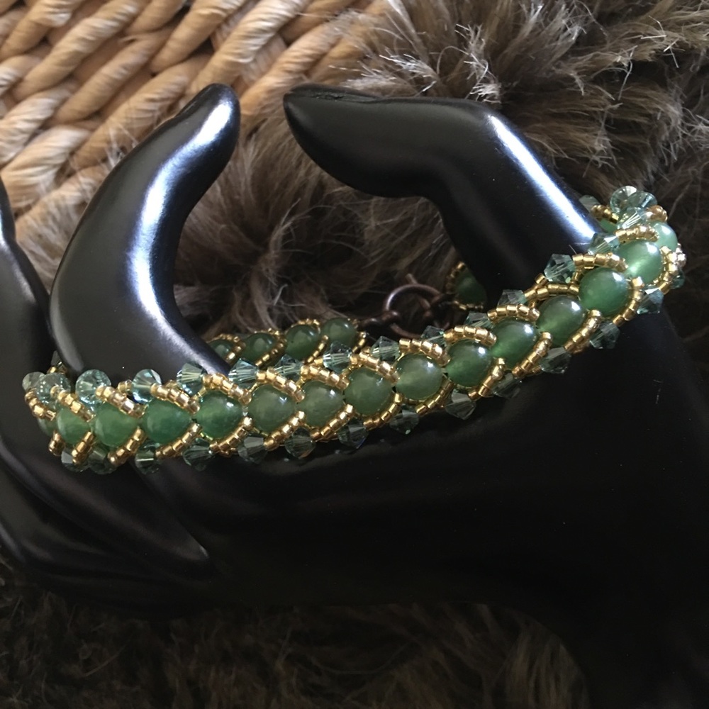 Vintage green and gold glass beaded bracelet
